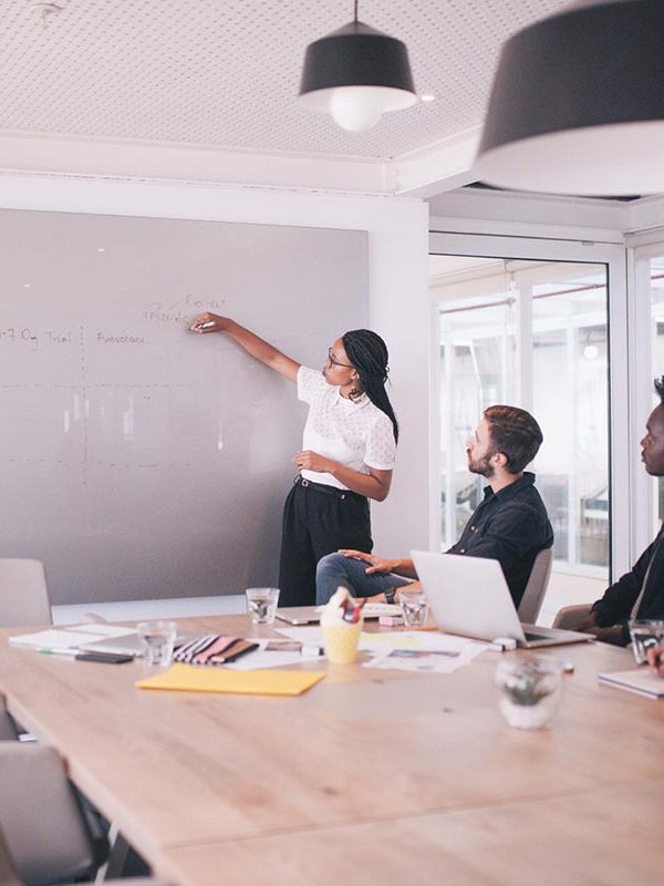 technology-office-businesswoman-laptop-together-meeting-team-whiteboard-start-up-board-room_t20_Ae6721